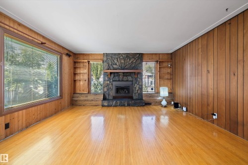 9911 149 Street, Edmonton, AB - Indoor Photo Showing Living Room With Fireplace