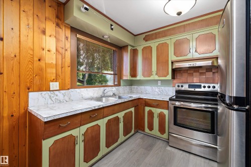 9911 149 Street, Edmonton, AB - Indoor Photo Showing Kitchen With Double Sink