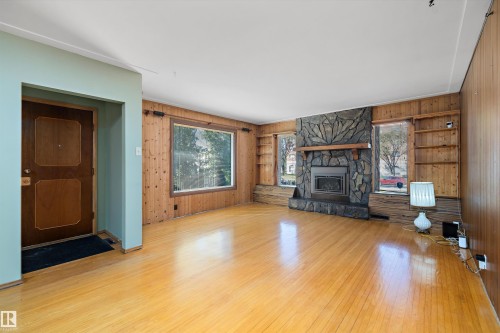 9911 149 Street, Edmonton, AB - Indoor Photo Showing Living Room With Fireplace