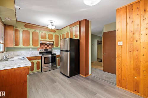 9911 149 Street, Edmonton, AB - Indoor Photo Showing Kitchen With Double Sink