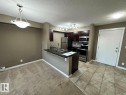 421 107 Watt Common, Edmonton, AB  - Indoor Photo Showing Kitchen With Double Sink 