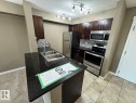 421 107 Watt Common, Edmonton, AB  - Indoor Photo Showing Kitchen With Double Sink 