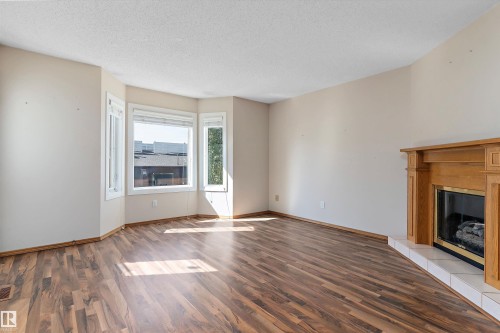 3520 60 Street, Edmonton, AB - Indoor Photo Showing Other Room With Fireplace