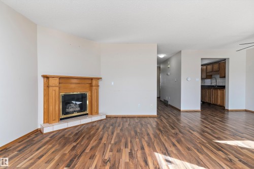 3520 60 Street, Edmonton, AB - Indoor Photo Showing Living Room With Fireplace