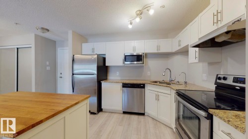 2107 9357 Simpson Drive, Edmonton, AB - Indoor Photo Showing Kitchen With Double Sink