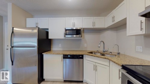 2107 9357 Simpson Drive, Edmonton, AB - Indoor Photo Showing Kitchen With Double Sink