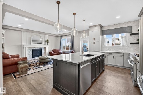 1411 25 Street, Edmonton, AB - Indoor Photo Showing Kitchen With Fireplace With Stainless Steel Kitchen With Upgraded Kitchen