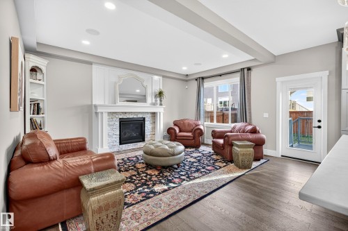 1411 25 Street, Edmonton, AB - Indoor Photo Showing Living Room With Fireplace