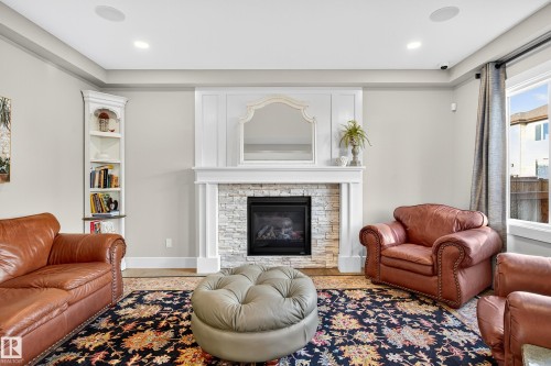 1411 25 Street, Edmonton, AB - Indoor Photo Showing Living Room With Fireplace