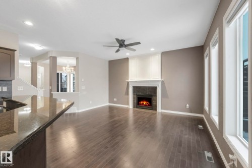 6126 17A Avenue, Edmonton, AB - Indoor Photo Showing Living Room With Fireplace