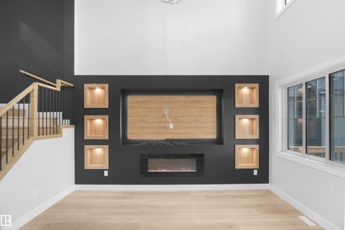 4007 41 Street, Beaumont, AB - Indoor Photo Showing Other Room With Fireplace