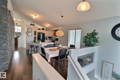 4343 Mcmullen Way, Edmonton, AB - Indoor Photo Showing Dining Room With Fireplace