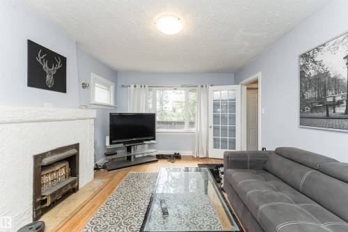 10918 84 Avenue, Edmonton, AB - Indoor Photo Showing Living Room With Fireplace