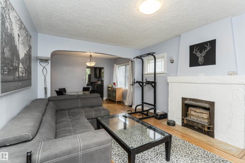 10918 84 Avenue, Edmonton, AB - Indoor Photo Showing Living Room With Fireplace