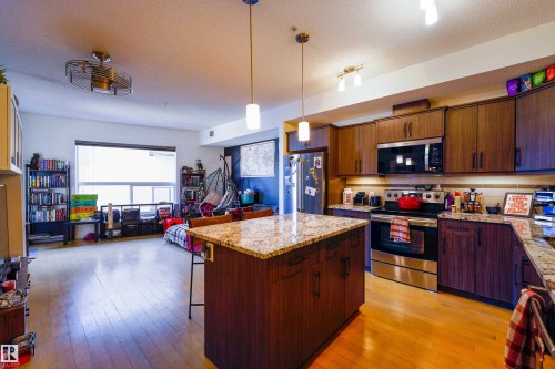 319 10523 123 Street, Edmonton, AB - Indoor Photo Showing Kitchen With Double Sink