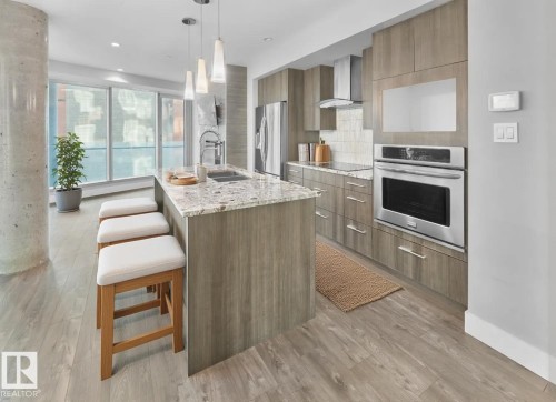 502 11969 Jasper Avenue, Edmonton, AB - Indoor Photo Showing Kitchen With Stainless Steel Kitchen With Upgraded Kitchen