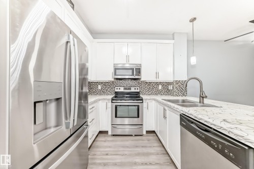 201 2588 Anderson Way, Edmonton, AB - Indoor Photo Showing Kitchen With Stainless Steel Kitchen With Double Sink With Upgraded Kitchen
