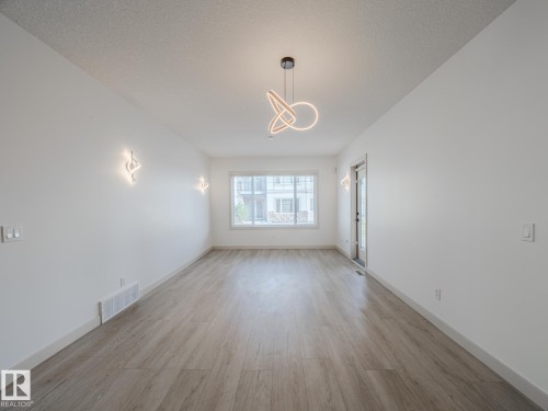 33 2565 Hanna Crescent Nw, Edmonton, AB - Indoor Photo Showing Other Room