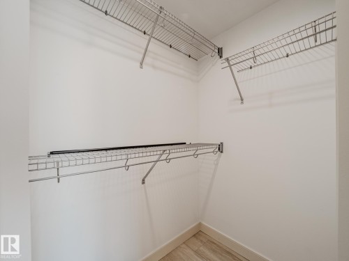 33 2565 Hanna Crescent Nw, Edmonton, AB - Indoor With Storage