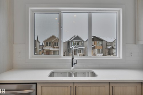 8929 Elves Loop, Edmonton, AB - Indoor Photo Showing Kitchen With Double Sink