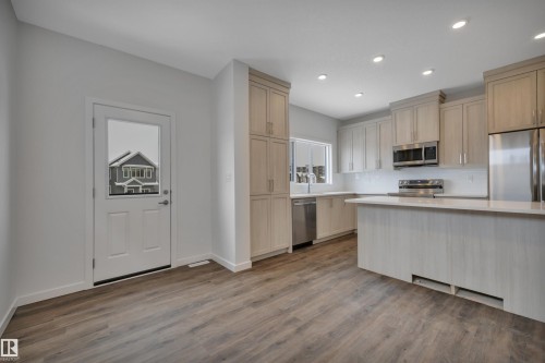 8929 Elves Loop, Edmonton, AB - Indoor Photo Showing Kitchen With Stainless Steel Kitchen With Upgraded Kitchen