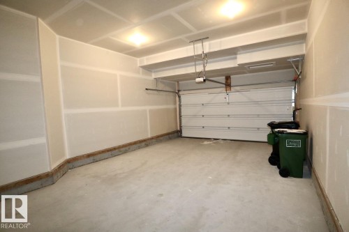 Upper 9406 Pear Crescent, Edmonton, AB - Indoor Photo Showing Garage