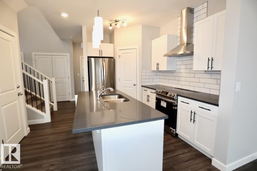 Upper 9406 Pear Crescent, Edmonton, AB - Indoor Photo Showing Kitchen With Double Sink With Upgraded Kitchen