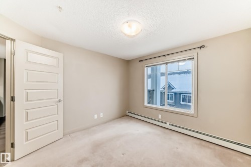 303 4008 Savaryn Drive, Edmonton, AB - Indoor Photo Showing Other Room