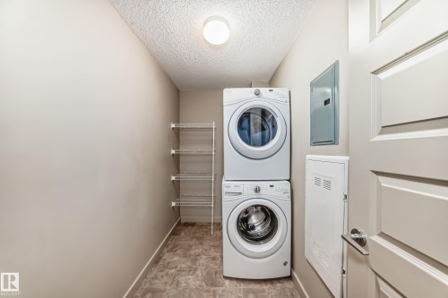 303 4008 Savaryn Drive, Edmonton, AB - Indoor Photo Showing Laundry Room