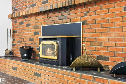 5558 145A Avenue, Edmonton, AB - Indoor Photo Showing Other Room With Fireplace