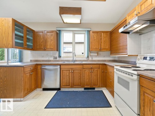 7404 Rowland Road, Edmonton, AB - Indoor Photo Showing Kitchen With Double Sink