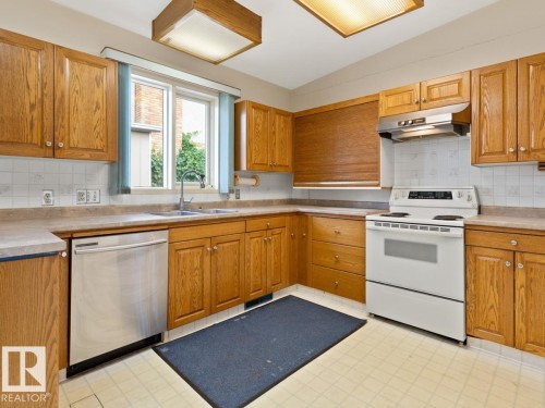 7404 Rowland Road, Edmonton, AB - Indoor Photo Showing Kitchen With Double Sink