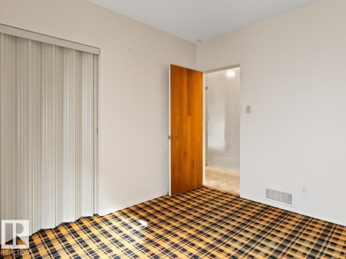 7404 Rowland Road, Edmonton, AB - Indoor Photo Showing Bedroom