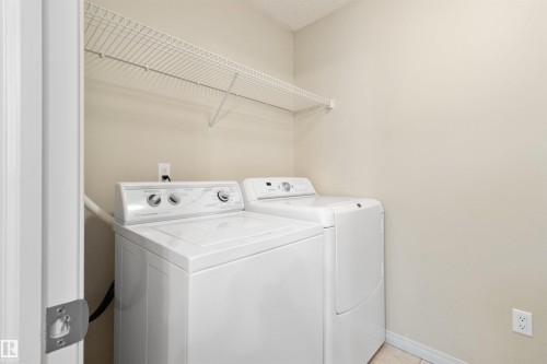 7 10848 8 Avenue, Edmonton, AB - Indoor Photo Showing Laundry Room