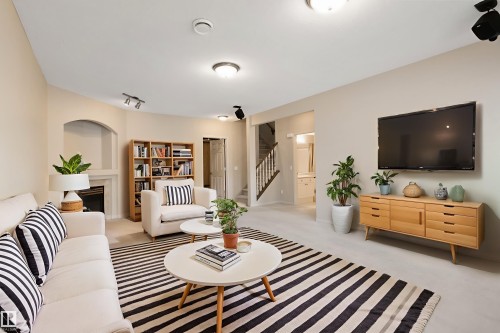 7 10848 8 Avenue, Edmonton, AB - Indoor Photo Showing Living Room