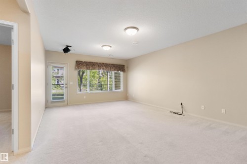 7 10848 8 Avenue, Edmonton, AB - Indoor Photo Showing Other Room