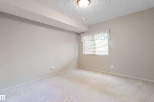 7 10848 8 Avenue, Edmonton, AB - Indoor Photo Showing Other Room