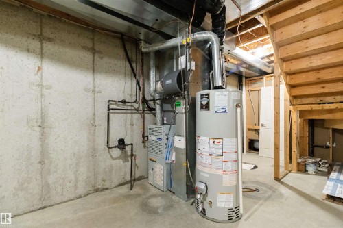 7 10848 8 Avenue, Edmonton, AB - Indoor Photo Showing Basement