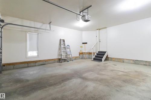 7 10848 8 Avenue, Edmonton, AB - Indoor Photo Showing Garage