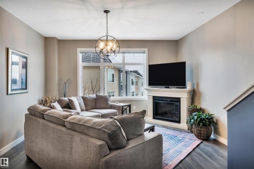 87 600 Bellerose Drive, St. Albert, AB - Indoor Photo Showing Living Room With Fireplace