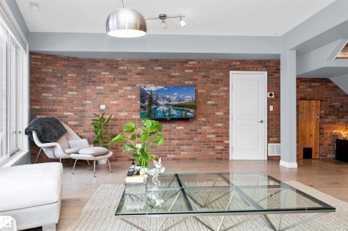 104 9804 101 Street, Edmonton, AB - Indoor With Fireplace