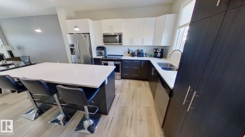 9876 206 Street, Edmonton, AB - Indoor Photo Showing Kitchen With Stainless Steel Kitchen With Double Sink