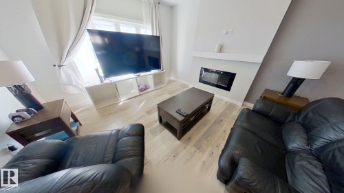 9876 206 Street, Edmonton, AB - Indoor Photo Showing Living Room With Fireplace