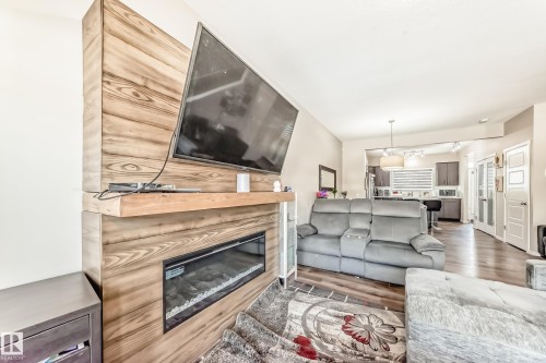 671 Lewis Green Drive, Edmonton, AB - Indoor Photo Showing Living Room With Fireplace