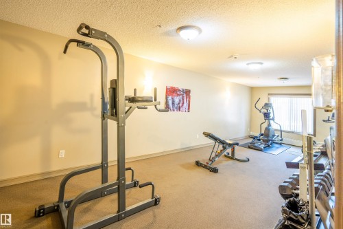 319 4407 23 Street, Edmonton, AB - Indoor Photo Showing Gym Room
