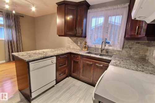 14608 29A Street, Edmonton, AB - Indoor Photo Showing Kitchen With Double Sink