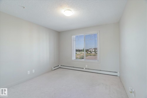 316 4008 Savaryn Drive, Edmonton, AB - Indoor Photo Showing Other Room
