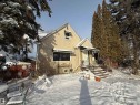 Snow covered house with stucco siding - 11022 110 Avenue, Edmonton, AB  - Outdoor 