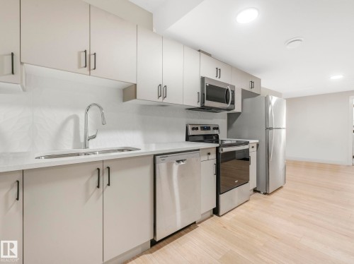 3063 200 Street, Edmonton, AB - Indoor Photo Showing Kitchen With Double Sink