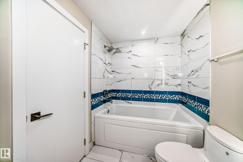 205 11710 87 Avenue, Edmonton, AB - Indoor Photo Showing Laundry Room